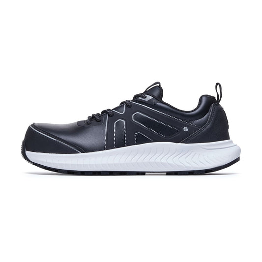 The Colly Black from Shoes For Crews has a slip-resistant, clog-resistant sole with TripGuard technology, a nanocomposite toecap (200 joules) and removable cushioned insoles, seen from the left.