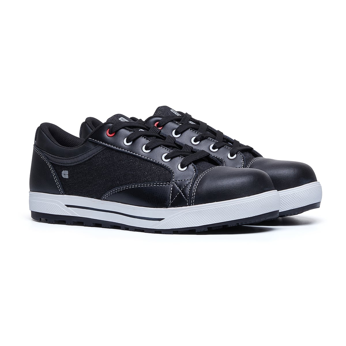 The Fergus Denim from Shoes For Crews is an slip-resistant safety shoe with a waterproof leather upper and a nanocomposite toe cap (200 joules), pair seen in profile on the right.