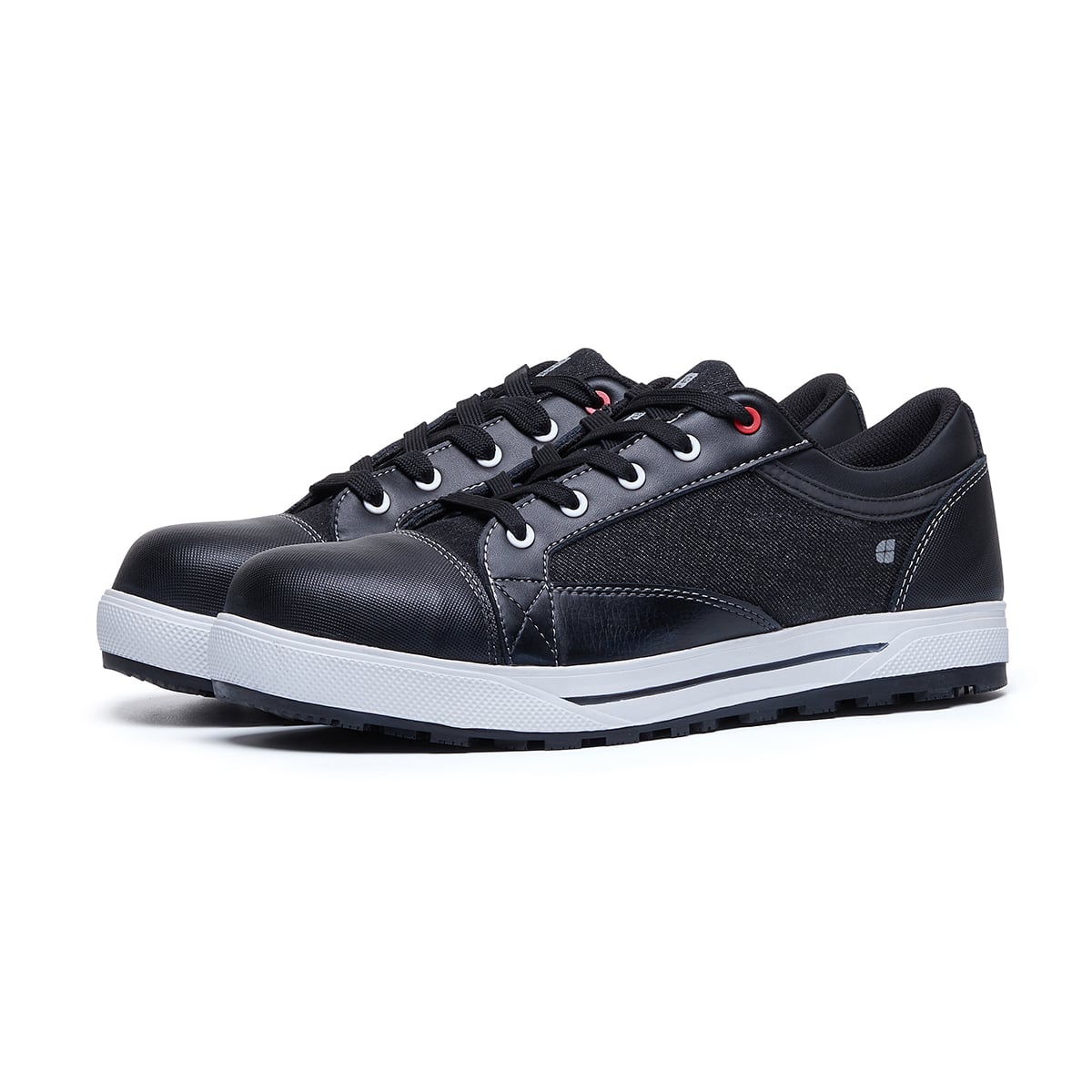 The Fergus Denim from Shoes For Crews is an slip-resistant safety shoe with a waterproof leather upper and a nanocomposite toe cap (200 joules), pair seen in profile on the left.