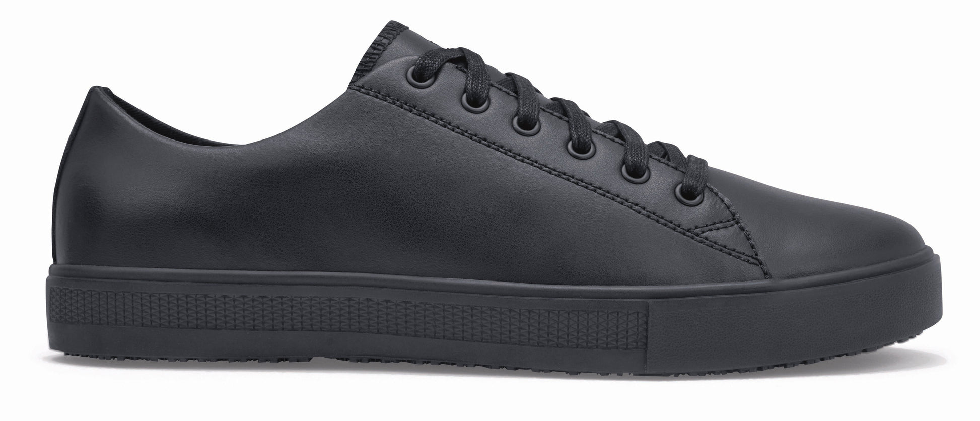 The Old School Low-Rider from Shoes For Crews is an slip-resistant lace-up shoe designed to provide comfort throughout the day, seen from the right.